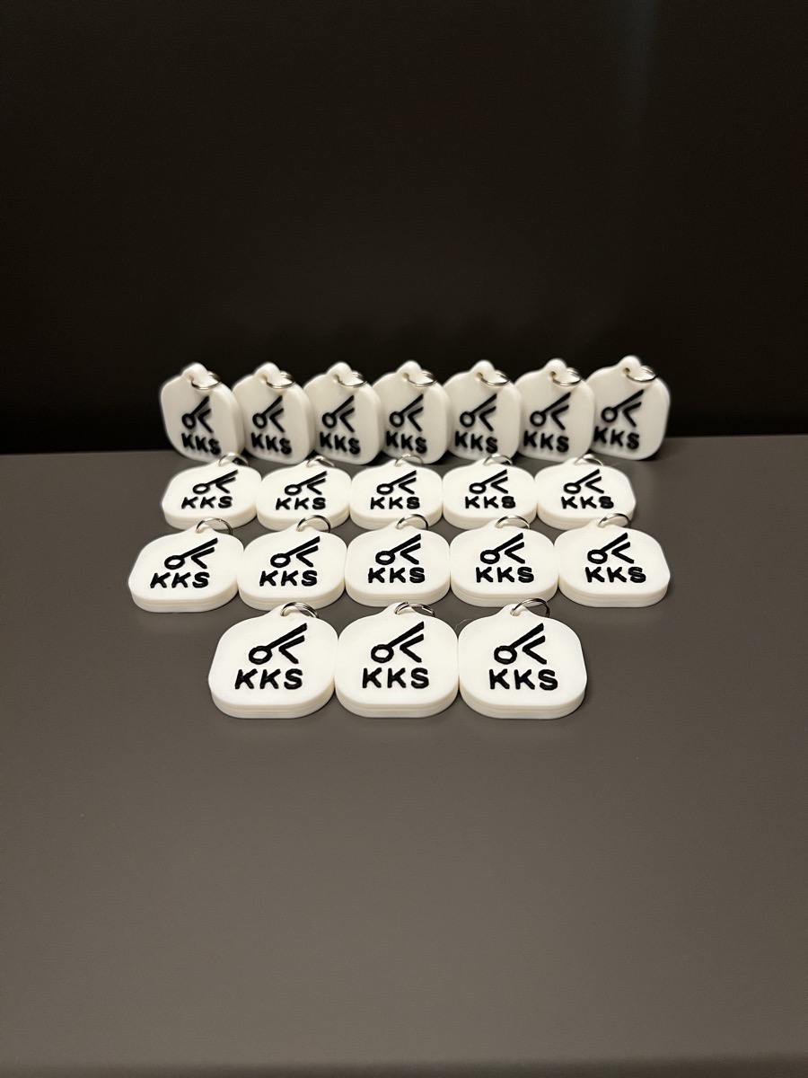 Bulk white KKS keychains